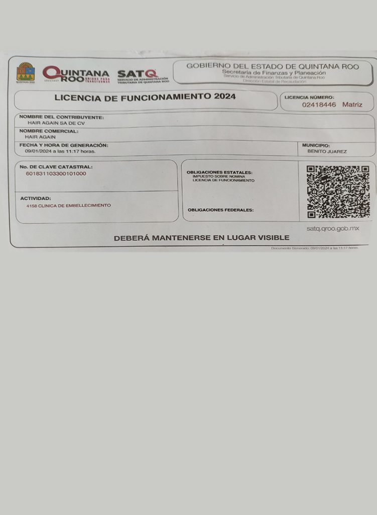 Photograph of a Mexican tax document showing financial details and filing information SAT Licencia de Funcionamiento