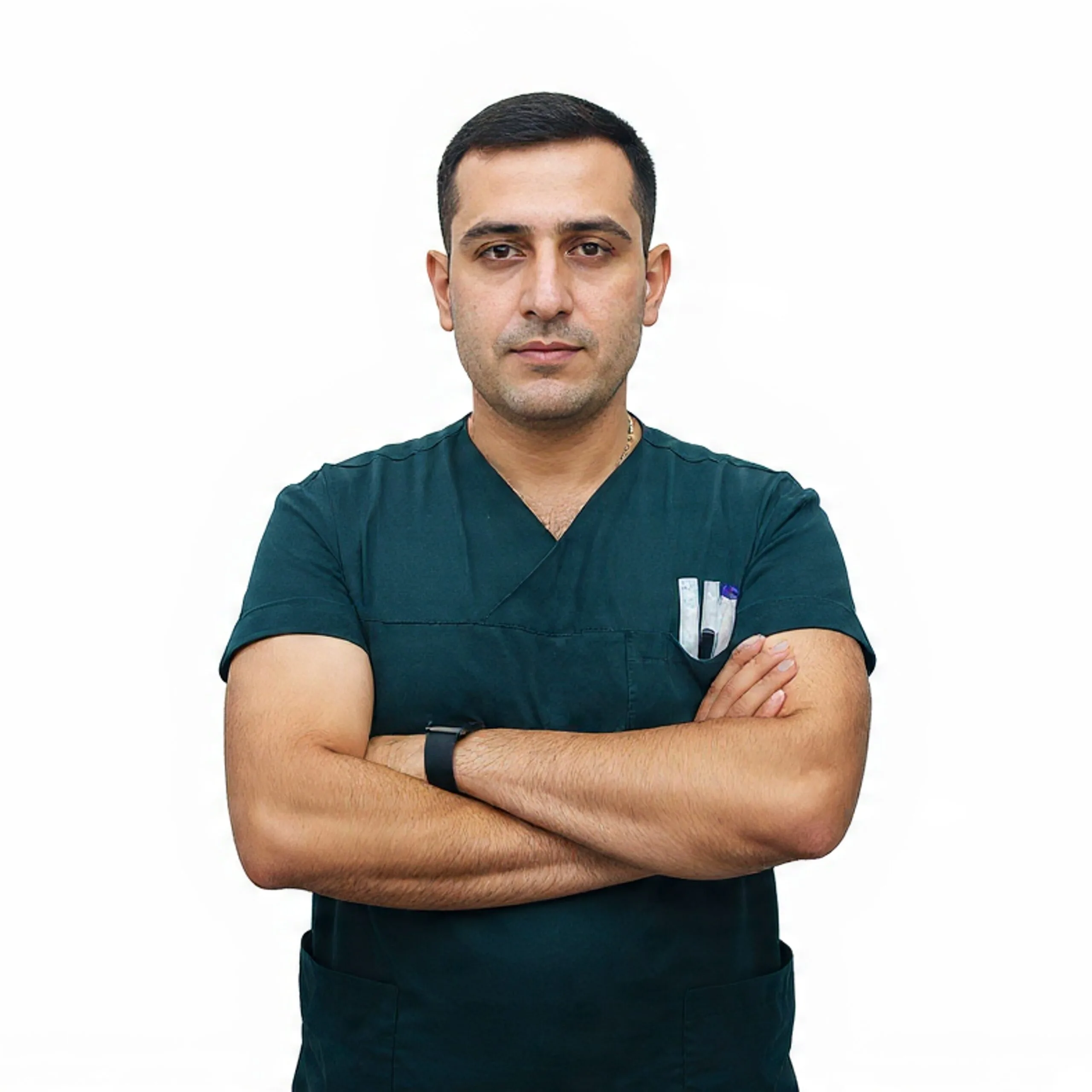 Dr. Onez Özkaya Lead Hair Transplant Specialist in green scrubs